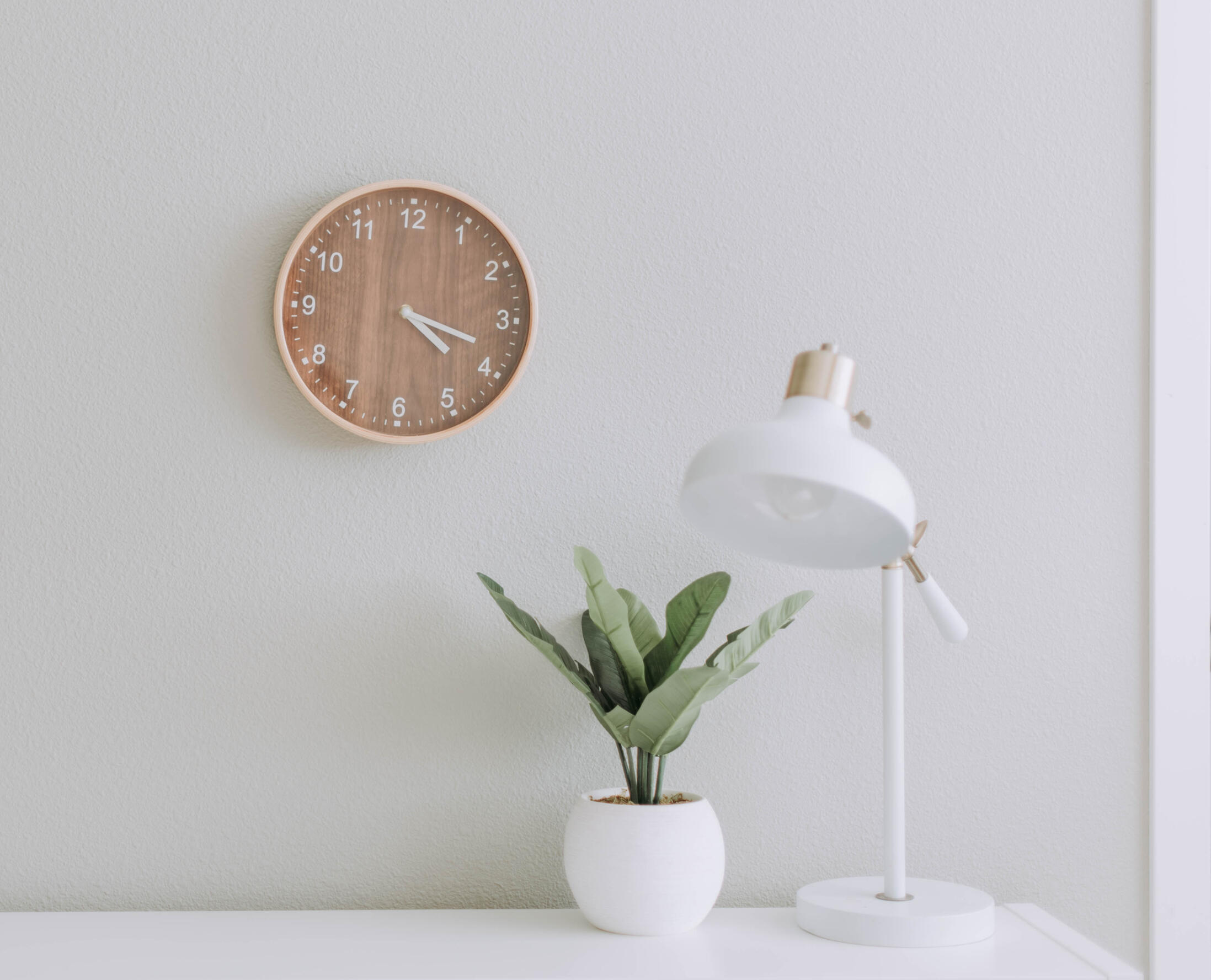 Desktop with clock and lamp